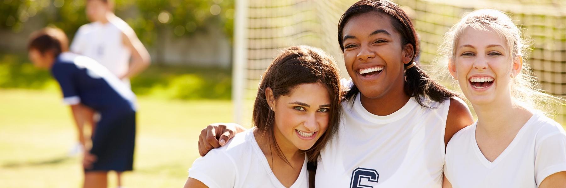 mouthguards coffs harbour | Young girls playing soccer