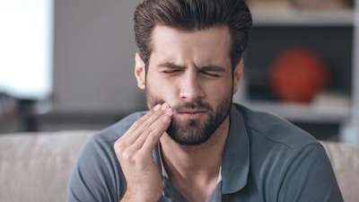 A man in need of a root canal in Coffs Harbour