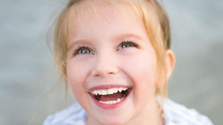 child smiling after visiting the childrens dentist coffs harbour