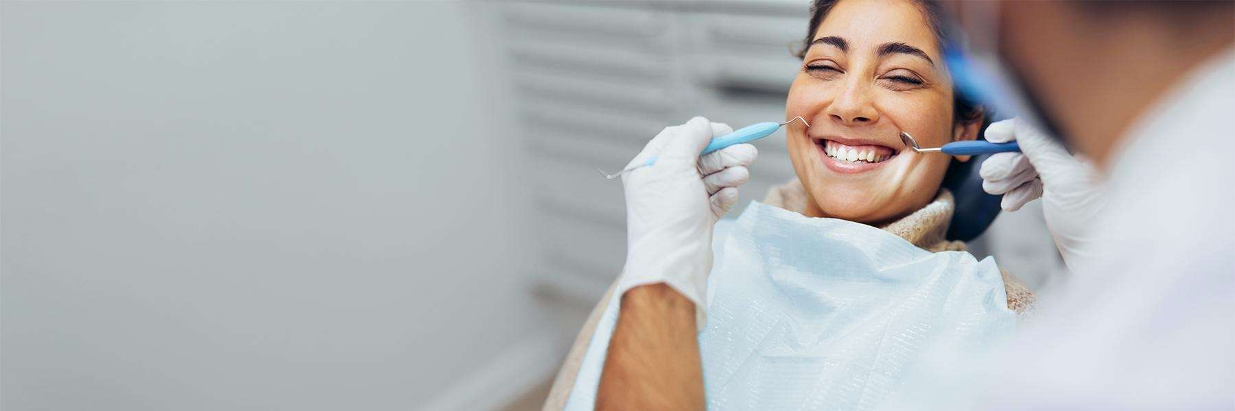 Woman getting a dental exam | Invisalign Coffs Harbour