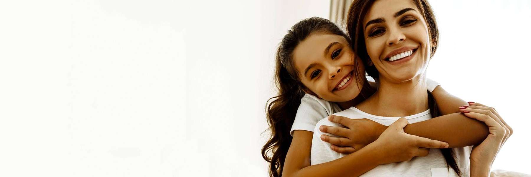 daughter embracing her mother