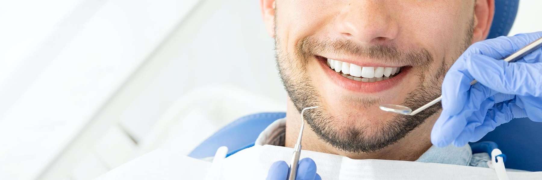 coffs harbour dentist | man getting dental exam