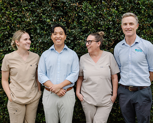 Arthur Street Dental young women huggin and smiling
